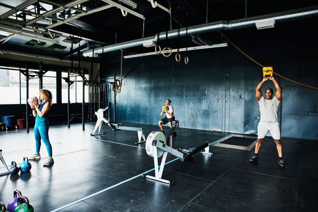 people doing a row workout crossfit