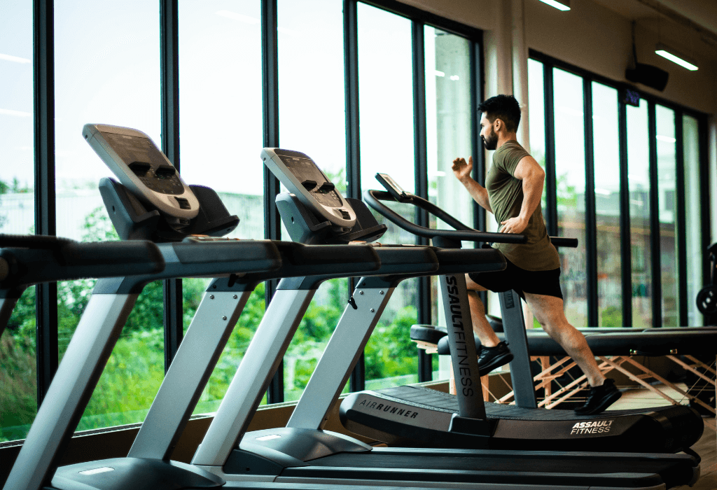 a mean taking advantage of the treadmill walk benefits for its workout