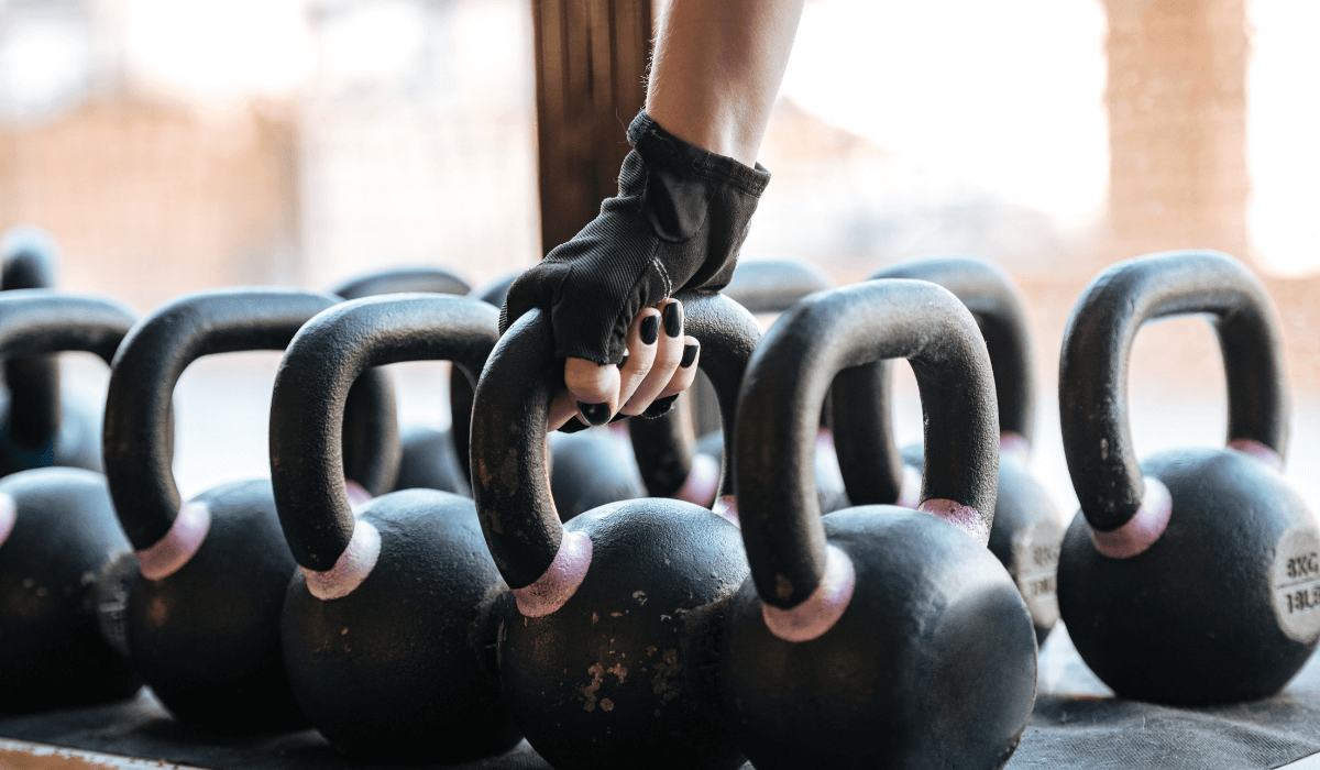 A man holding a ketllebell