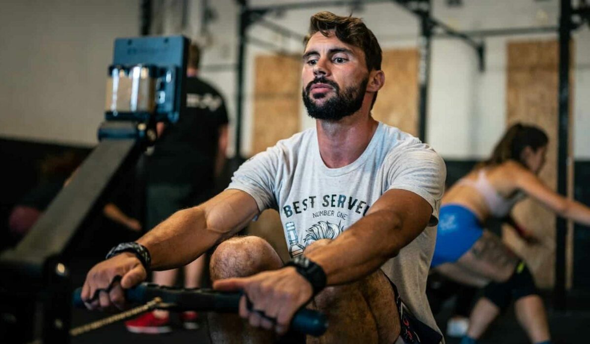 a man training its 5000 m row time