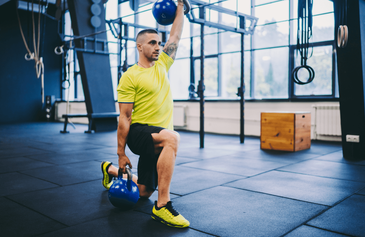 A man doing the kettlebell clean exercise