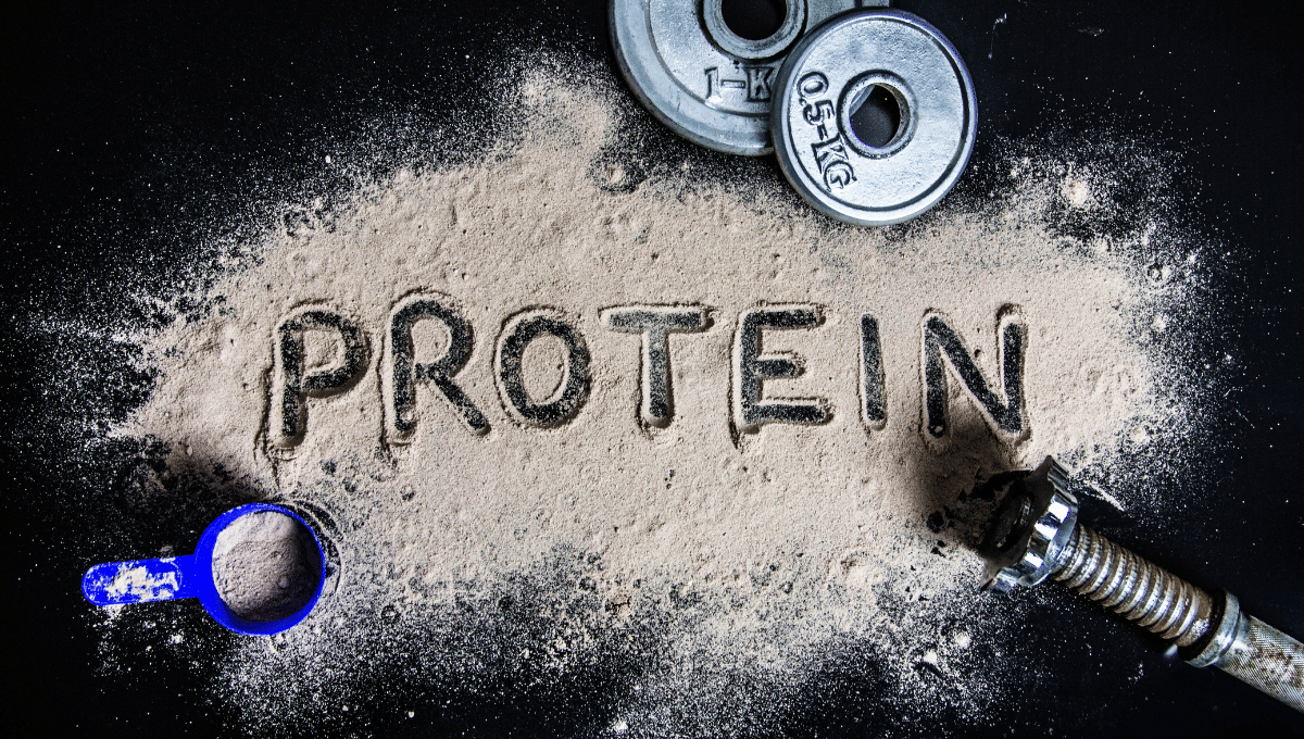 Different types of food protein with some weights on the floor