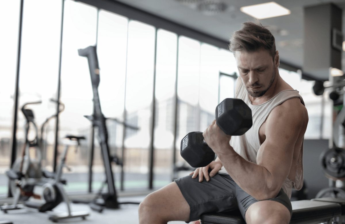 A man works out with dumbbells