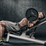 A man does incline barbell press