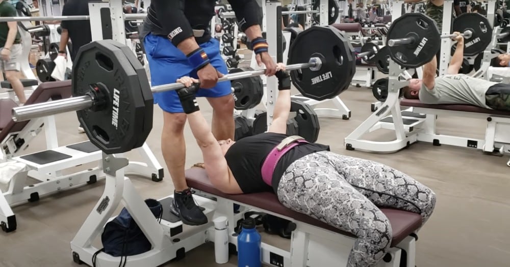 women bench press